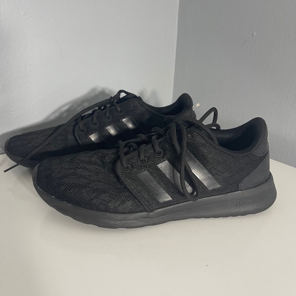 solid black adidas shoes